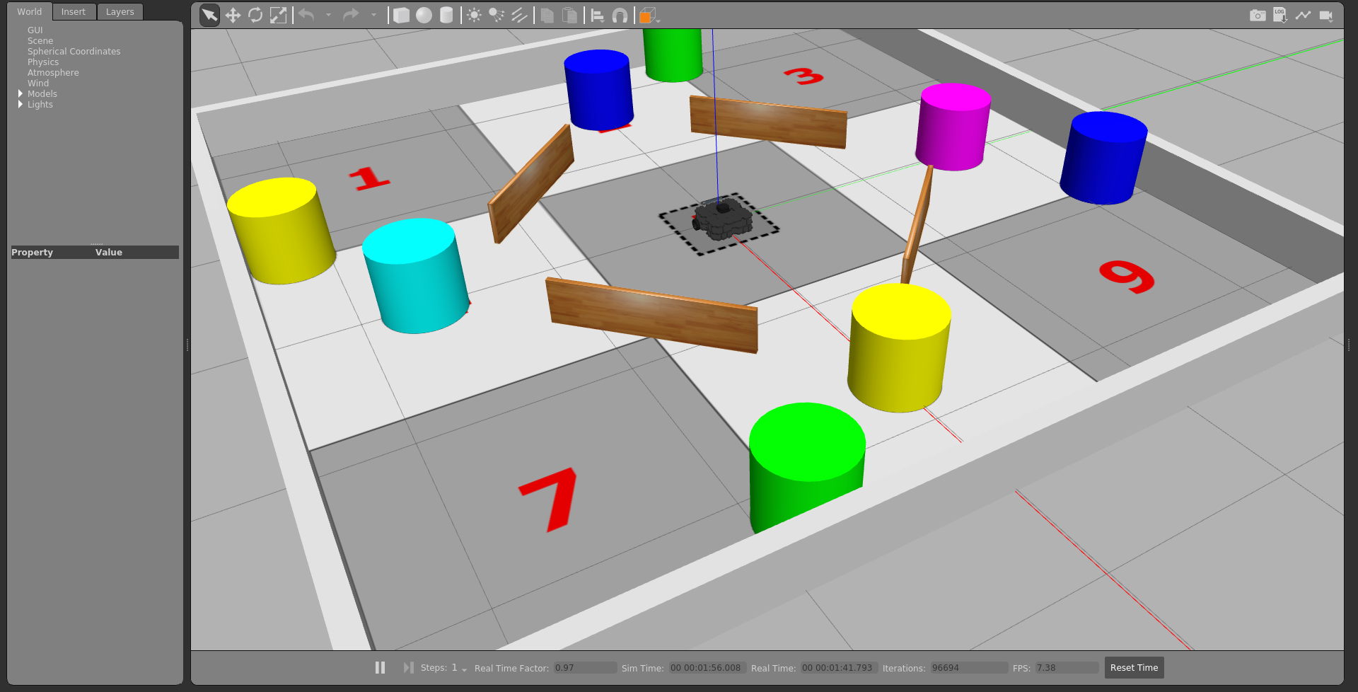 Screenshot of a live Gazebo simulation showing a TurtleBot3 Waffle robot in the COM2009 course's numbered-zone arena, surrounded by coloured obstacles